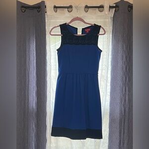 Elle, great condition. Great dress for a night out, work or church!